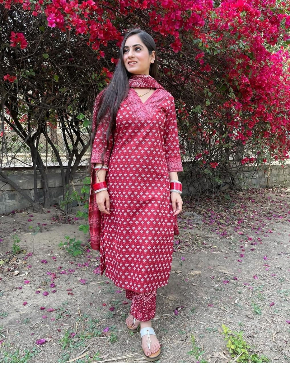 Mustard and red Floral simple suit set which is decorated with finest , and motifs.It is paired with matching Afghani pants and dupatta