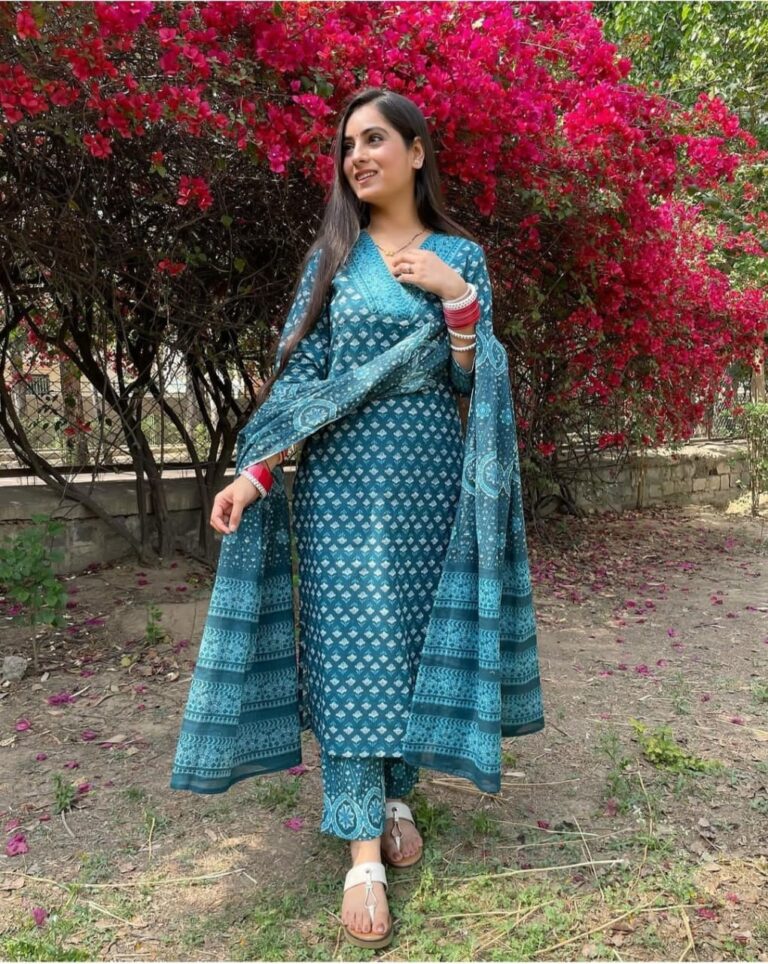 Mustard and red Floral simple suit set which is decorated with finest , and motifs.It is paired with matching Afghani pants and dupatta