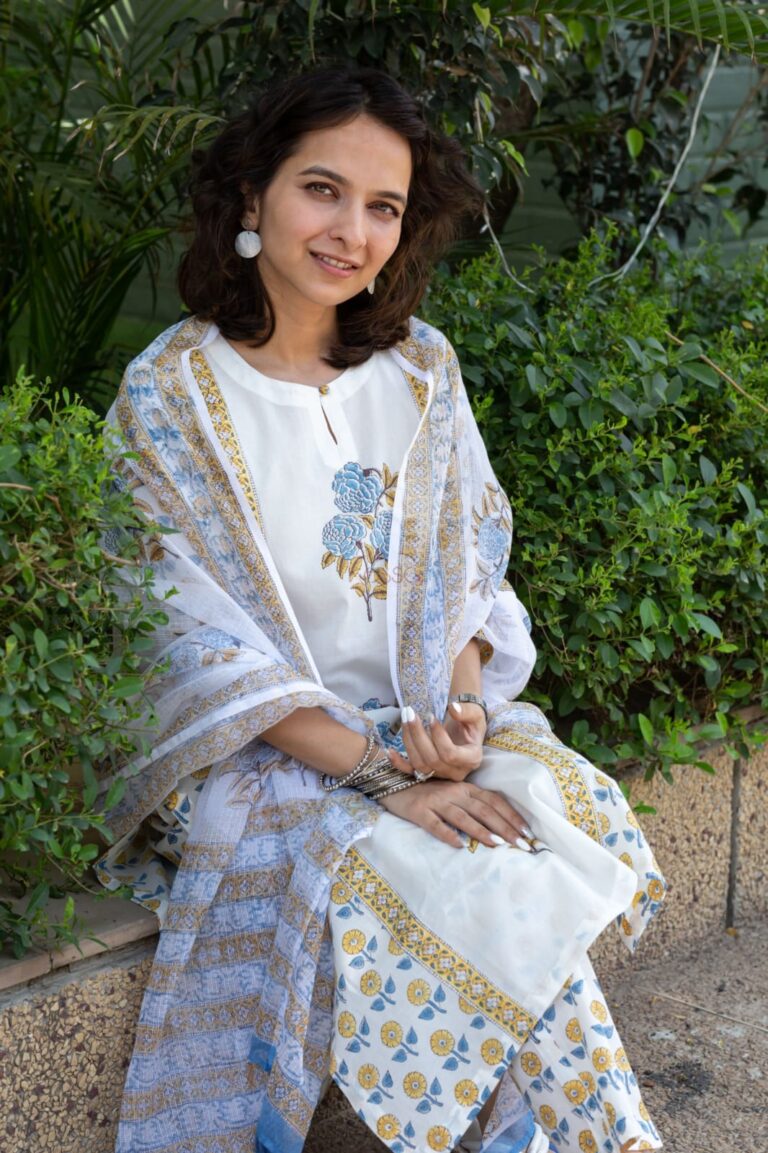 Mustard and red Floral simple suit set which is decorated with finest , and motifs.It is paired with matching Afghani pants and dupatta