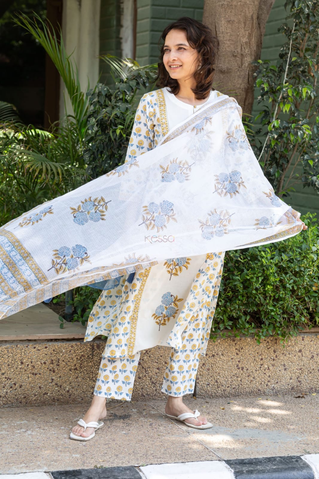 Mustard and red Floral simple suit set which is decorated with finest , and motifs.It is paired with matching Afghani pants and dupatta