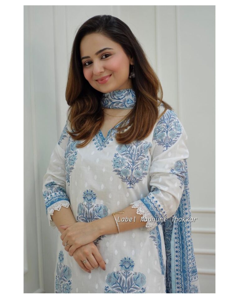 white – grey Floral  suit set which is decorated with finest self print  work  and motifs